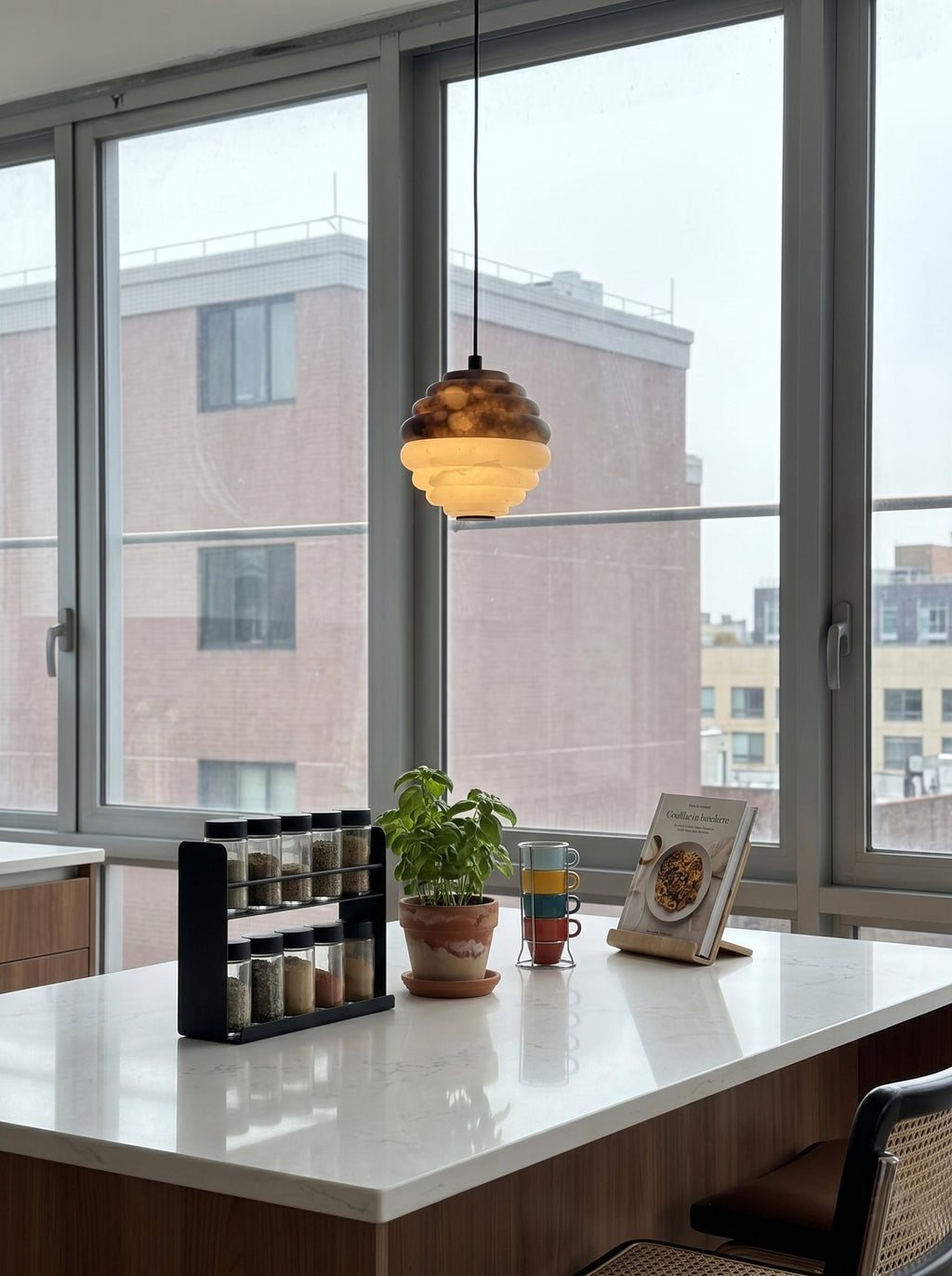 Mireille Alabaster Pendant Lamp — product setting and fixture profile, a ribbed stone shade with contrasting pale and amber tones (view 2)