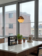 Mireille Alabaster Pendant Lamp — product setting and fixture profile, a ribbed stone shade with contrasting pale and amber tones (view 2)