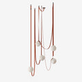 Multiple Belt Alabaster Pendant Light — full fixture profile, rounded stone shades suspended from individual leather or canvas straps (view 1)