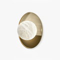 Ophela Alabaster Sconce — full fixture profile, a carved stone shade on a brass wall backplate (view 1)