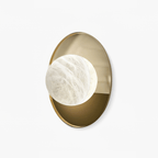 Ophela Alabaster Sconce — full fixture profile, a carved stone shade on a brass wall backplate (view 1)