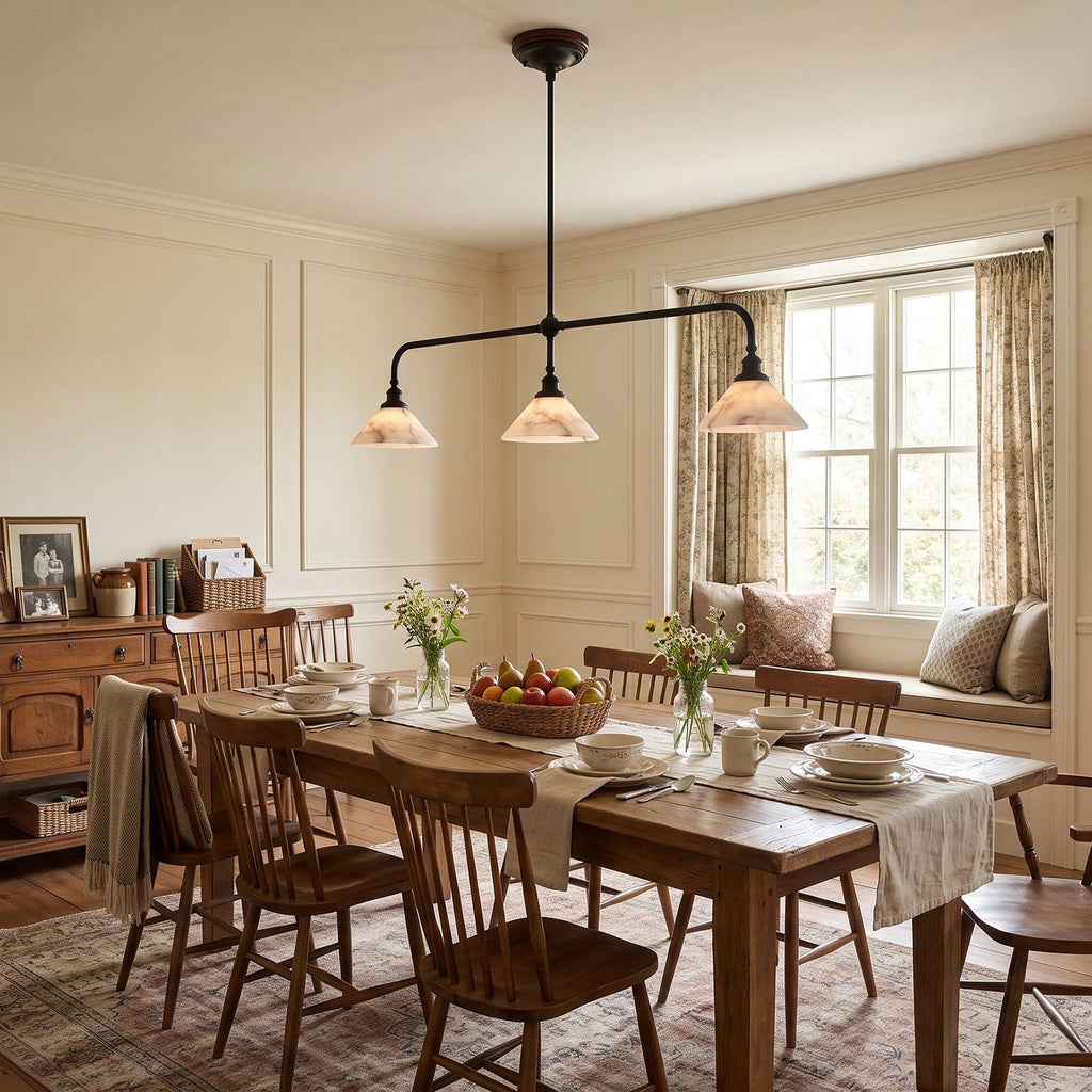 Parlor Alabaster Linear Pendant Lamp — additional product view, stone cone shades suspended from a gently curved bar (view 4)
