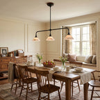 Parlor Alabaster Linear Pendant Lamp — additional product view, stone cone shades suspended from a gently curved bar (view 4)