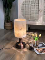 Pear Shaped Alabaster Table Lamp — product setting and fixture profile, a stone shade above a metallic tabletop base (view 2)