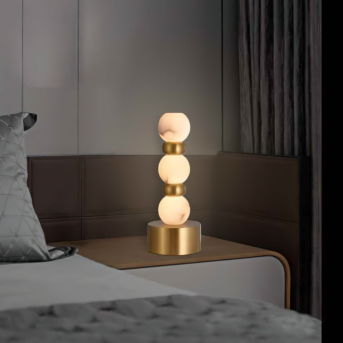 Pearl Xyx Alabaster Table Lamp — additional product view, three rounded stone forms above a metal base (view 3)