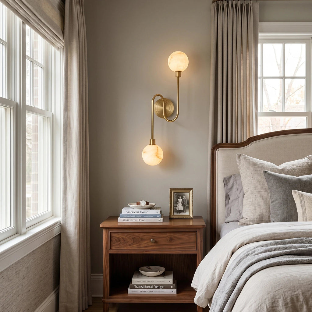 Perigee Alabaster Wall Sconce — product setting and fixture profile, two stone globes carried by a slim metal arm (view 2)
