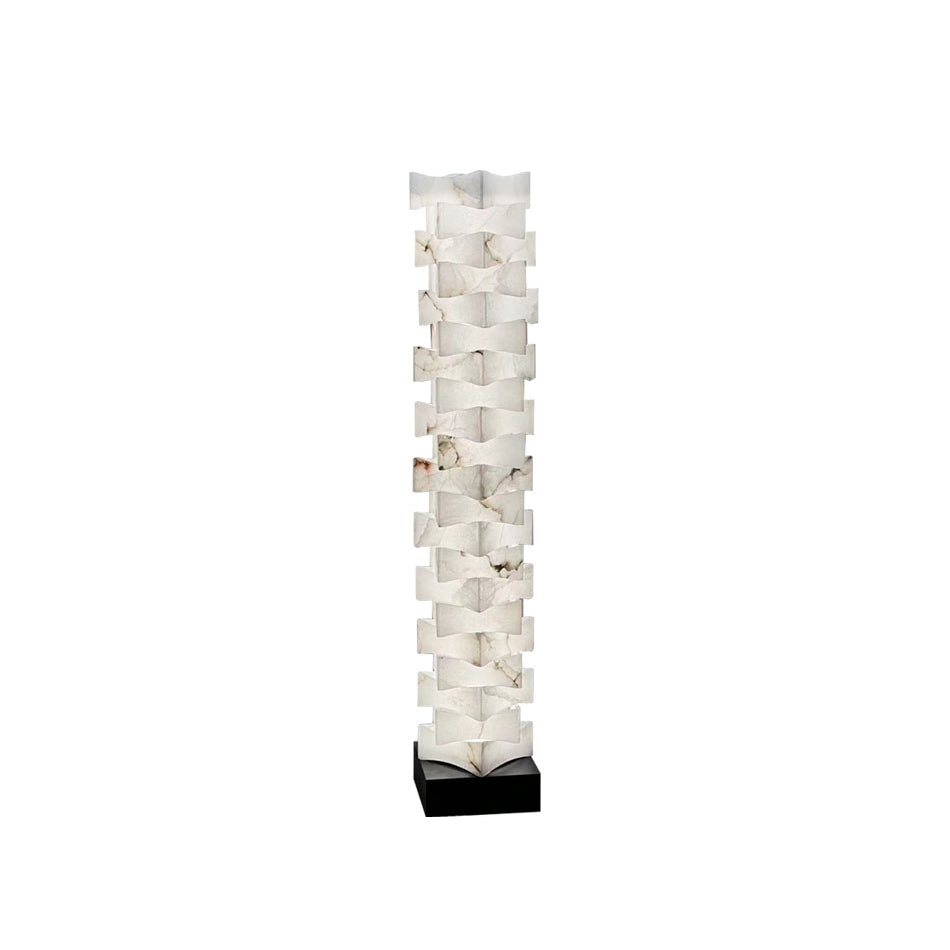 Stacked Alabaster Floor Light — full fixture profile, rotated stone blocks stacked above a dark metal base (view 1)