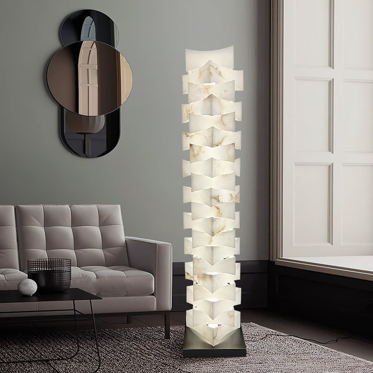 Stacked Alabaster Floor Light — product setting and fixture profile, rotated stone blocks stacked above a dark metal base (view 2)