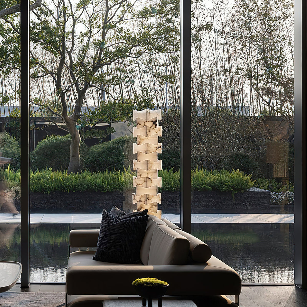 Stacked Alabaster Floor Light — additional product view, rotated stone blocks stacked above a dark metal base (view 5)