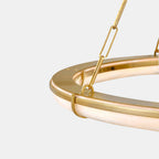 Sennett Alabaster Chandelier — product setting and fixture profile, a broad ring-shaped stone diffuser with brass framework (view 2)