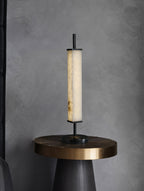 Serano Alabaster Table Lamp — product setting and fixture profile, a stone shade with clean, restrained lamp hardware (view 2)