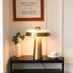 Solis Alabaster Disc Table Lamp — product setting and fixture profile, a flat stone disc above a tapered metal column (view 2)