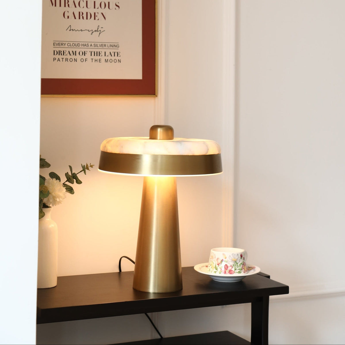 Solis Alabaster Disc Table Lamp — additional product view, a flat stone disc above a tapered metal column (view 5)