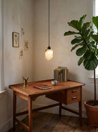 Solstice Nugget Alabaster Pendant Lamp — product setting and fixture profile, a rough-textured stone shade suspended as a small pendant (view 2)