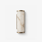Strivane fluted wall sconce with a ribbed shade and brass-finish end caps
