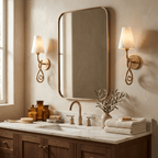 Tangle Alabaster Knot Sconce — product setting and fixture profile, a tapered stone shade above a knotted brass arm (view 2)