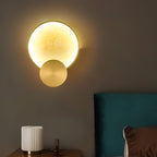Terra Svet Alabaster Wall Lamp — additional product view, a rounded stone diffuser accented by gold-finished circular metal details (view 3)