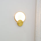 Terra Svet Alabaster Wall Lamp — additional product view, a rounded stone diffuser accented by gold-finished circular metal details (view 4)