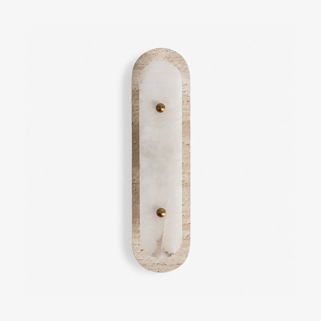 Travertine Pill Sconce — full fixture profile, a pill-shaped travertine frame surrounding a stone inset (view 1)