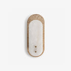 Travertine Pill Sconce — additional product view, a pill-shaped travertine frame surrounding a stone inset (view 5)