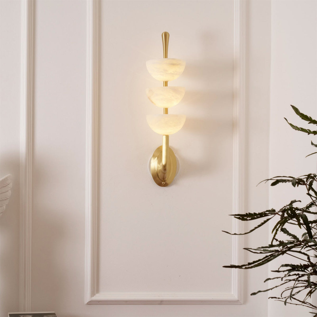 Triple Alabaster Wall Lamp — additional product view, three stone shades on a brass wall frame (view 4)