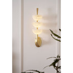 Triple Alabaster Wall Lamp — additional product view, three stone shades on a brass wall frame (view 5)