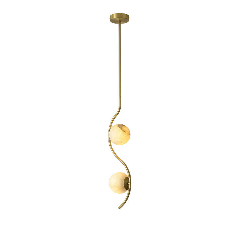 Uva Curved Pendant Lamp — full fixture profile, a stone shade carried by curved brass hardware (view 1)