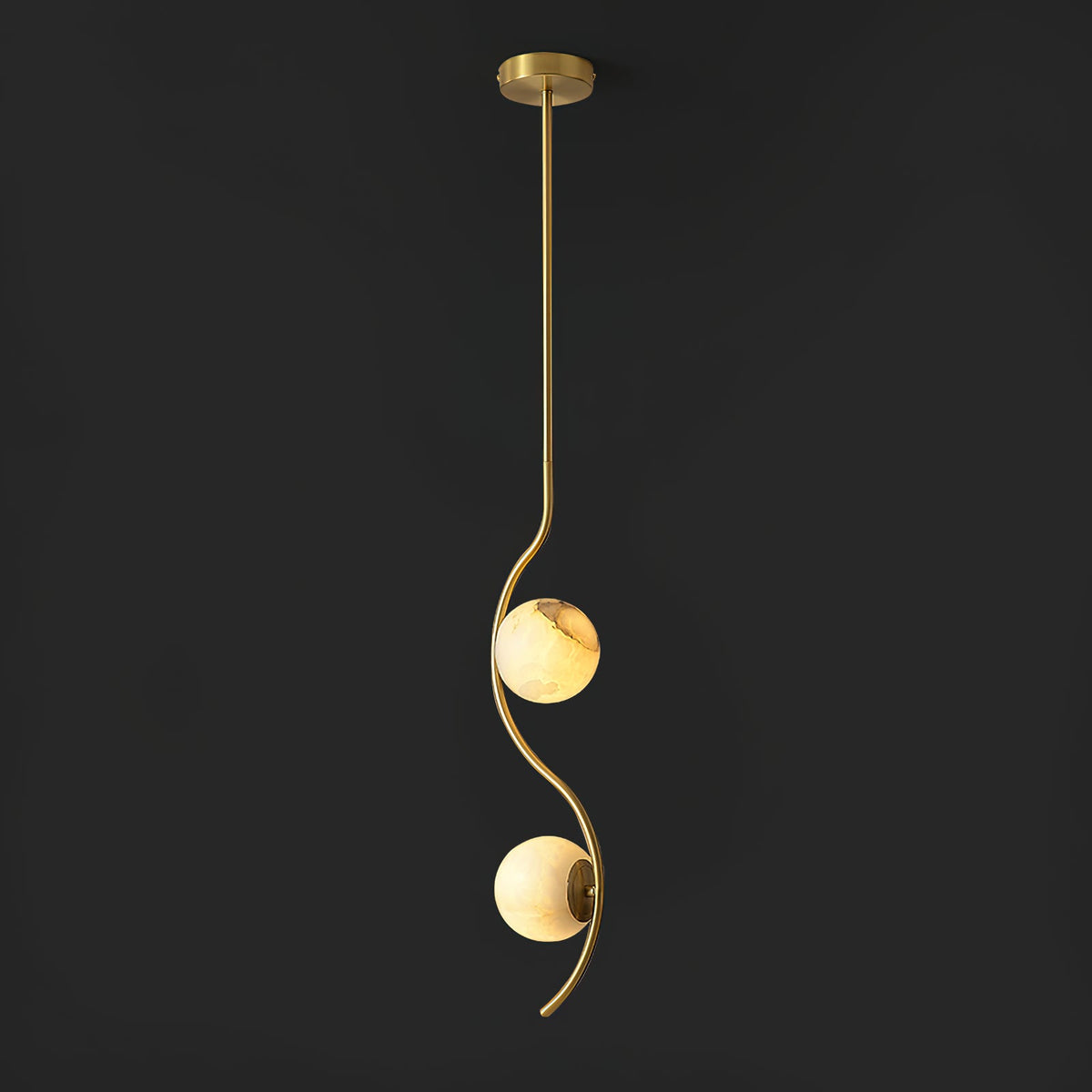 Uva Curved Pendant Lamp — additional product view, a stone shade carried by curved brass hardware (view 4)