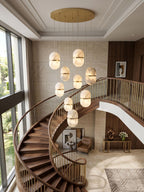 YUM Alabaster Pendant Light — additional product view, a suspended stone form with a balanced geometric profile (view 5)