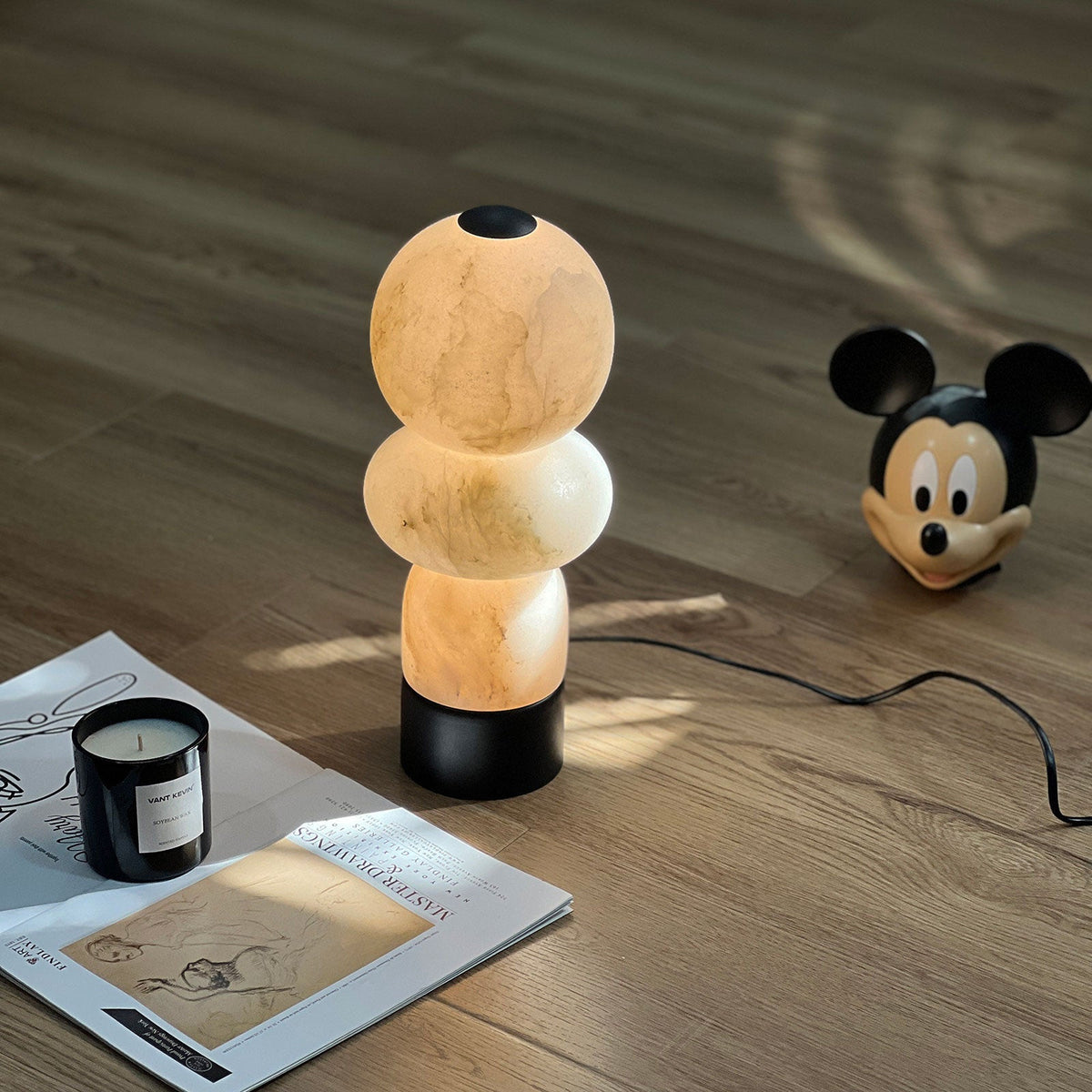 Zinnia Stacked Orb Table Lamp — additional product view, rounded stone forms stacked above a dark base (view 3)