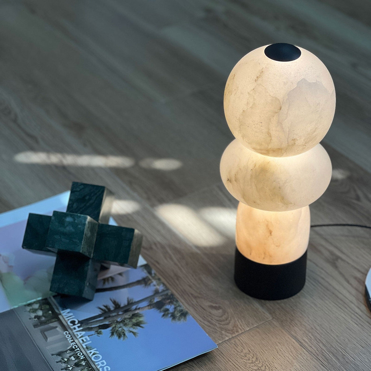 Zinnia Stacked Orb Table Lamp — additional product view, rounded stone forms stacked above a dark base (view 4)