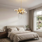 Britannica round glass chandelier in a bedroom