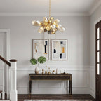 Britannica round chandelier in a modern entryway