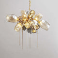 Britannica chandelier close-up with faceted glass and gold-tone details
