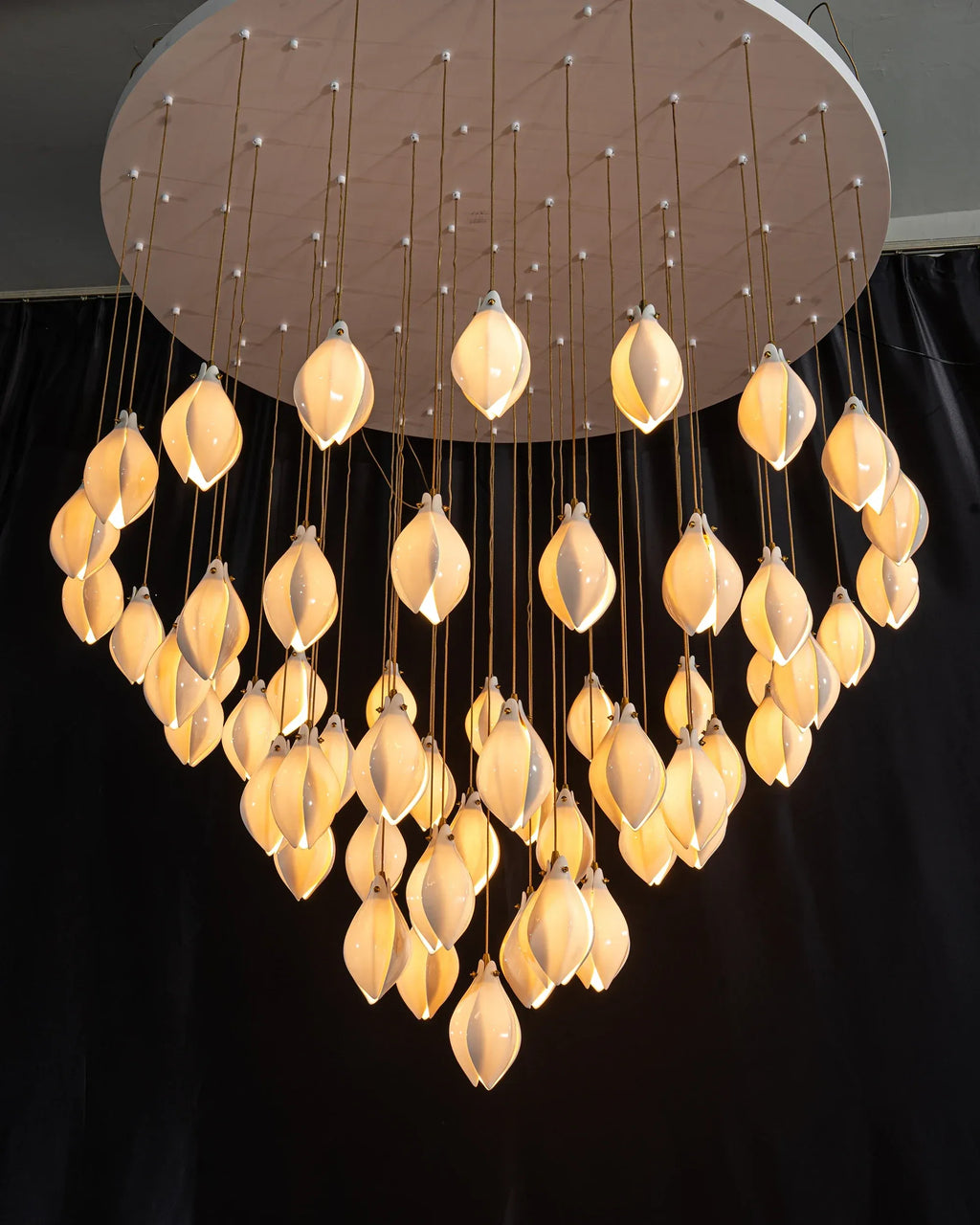 Ceramic Magnolia Staircase Chandelier foyer view with hanging ceramic flower lights