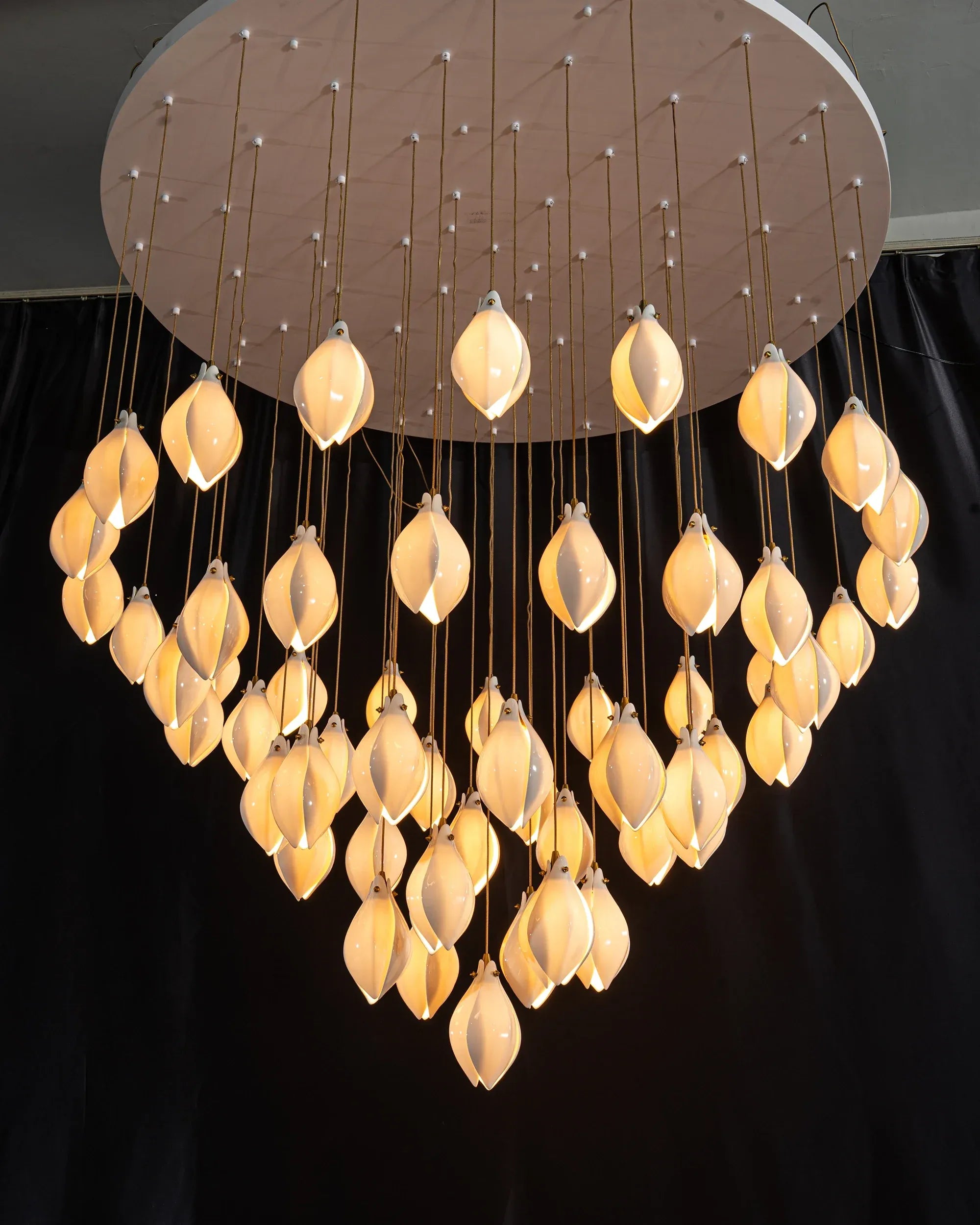Ceramic Magnolia Staircase Chandelier foyer view with hanging ceramic flower lights
