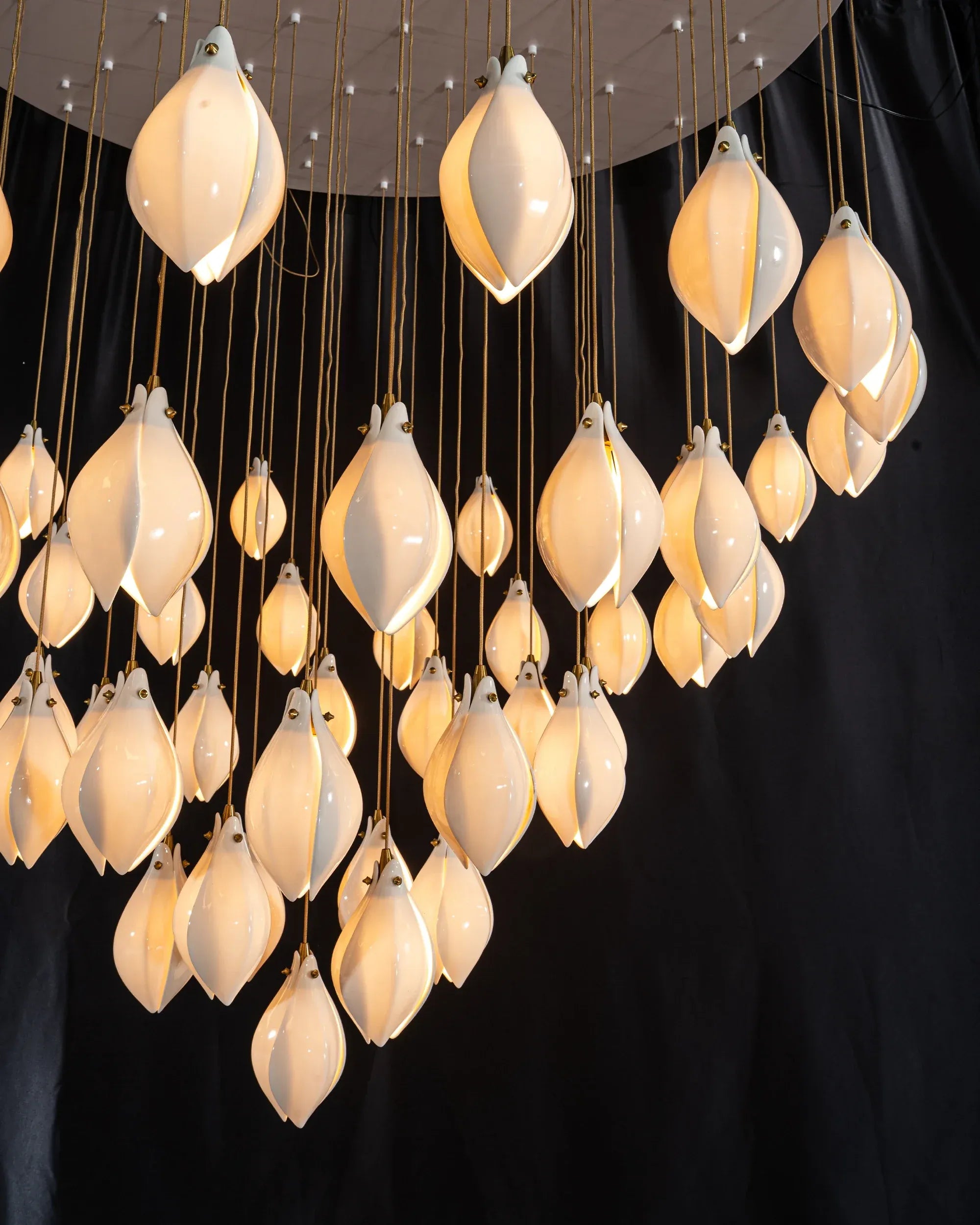 Ceramic Magnolia Staircase Chandelier hanging cluster with multiple ceramic flower pendants