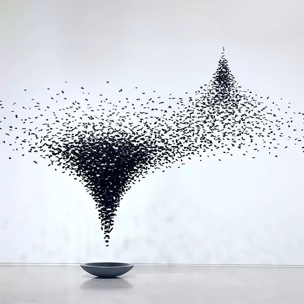 Charcoal Shape Hourglass Chandelier chandelier in a tall interior