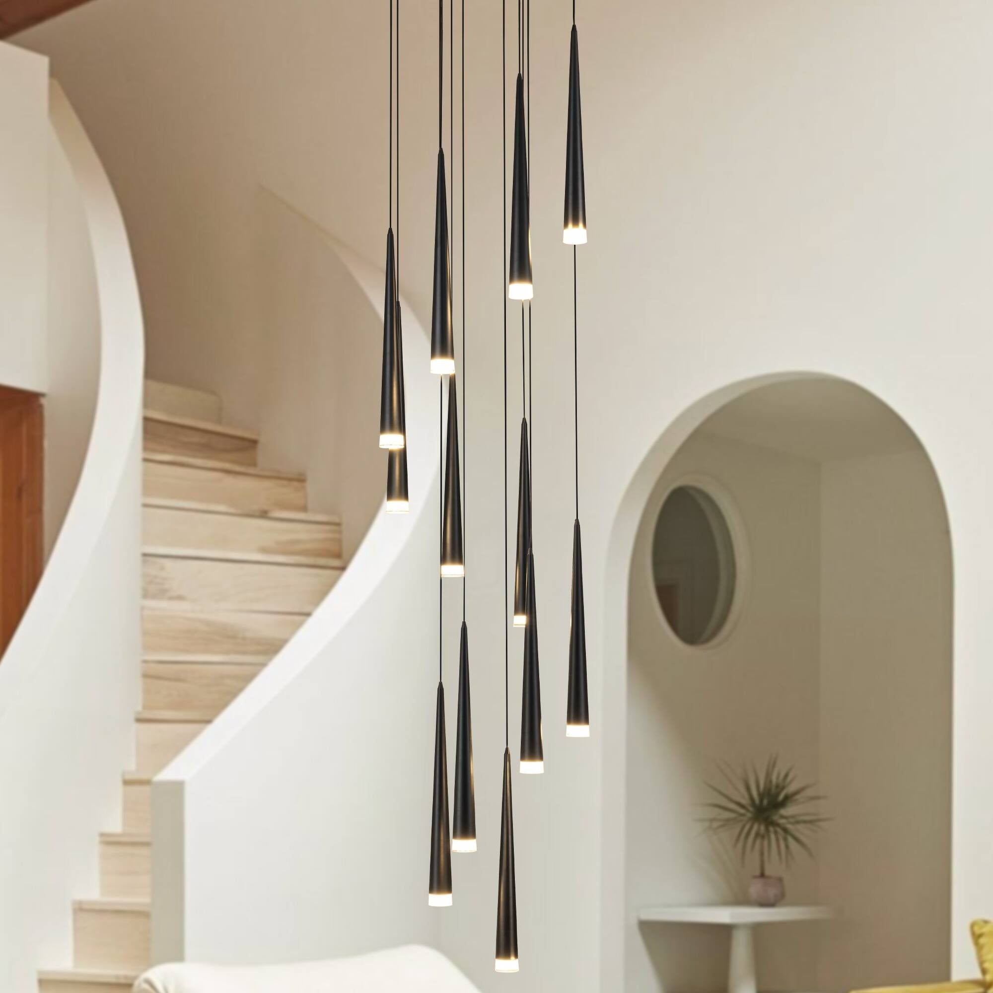Contemporary Black LED Pendant Light for Stairwell hanging beside a curved staircase