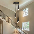 Contemporary Black LED Pendant Light for Stairwell in a tall stairway with multiple black cone lights