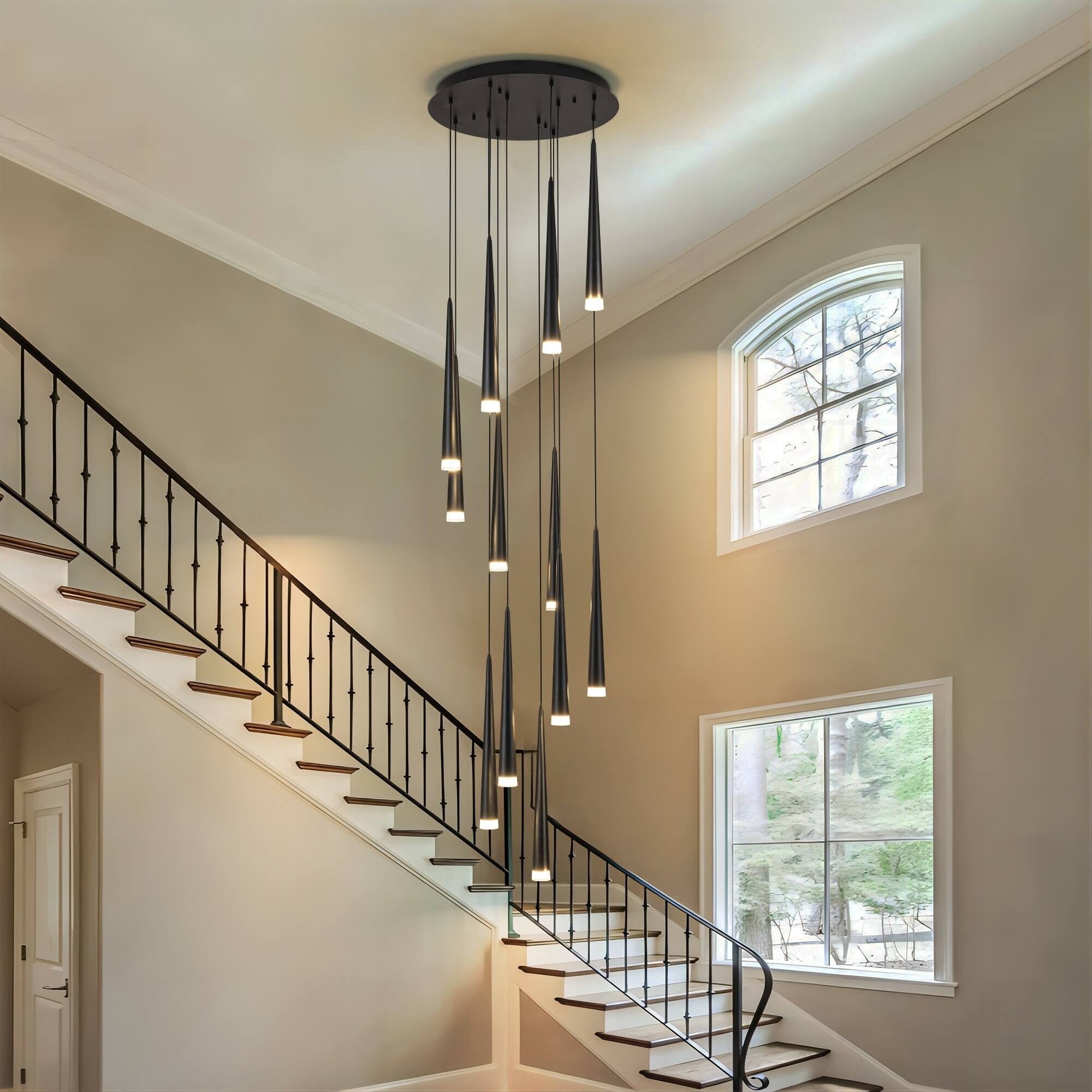 Contemporary Black LED Pendant Light for Stairwell in a tall stairway with multiple black cone lights
