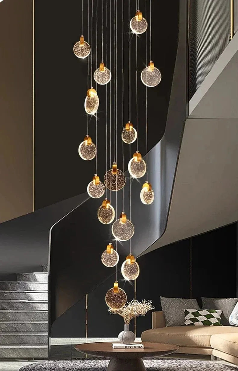Contemporary LED Chandelier with Crystal Pendant in a black staircase living room with cascading illuminated crystal discs