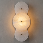 Cosmic Round Alabaster Wall Sconce by Bling Lighting Studio