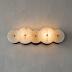 Cosmic Round Alabaster Wall Sconce by Bling Lighting Studio