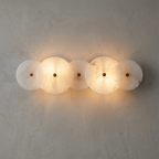 Cosmic Round Alabaster Wall Sconce by Bling Lighting Studio
