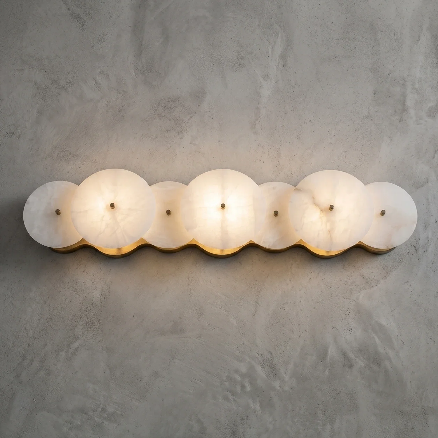 Cosmic Round Alabaster Wall Sconce by Bling Lighting Studio