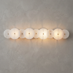 Cosmic Round Alabaster Wall Sconce by Bling Lighting Studio