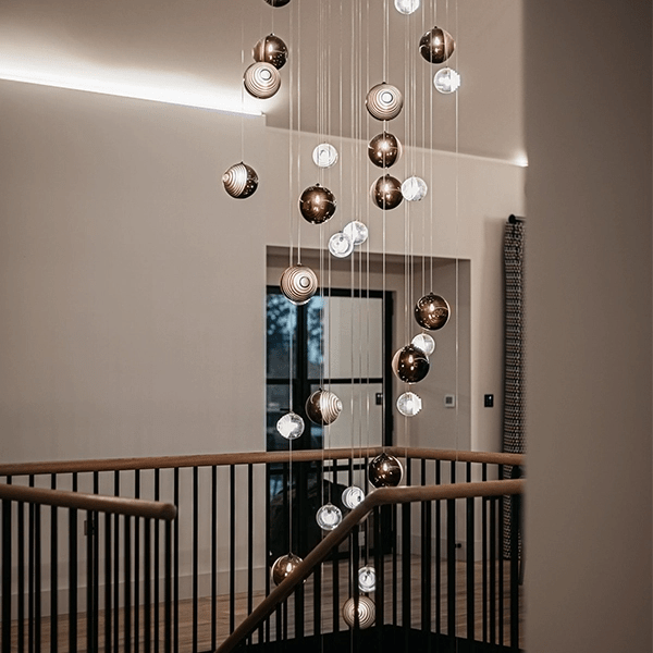Cosmic Sphere Cascade Chandelier chandelier in a tall interior