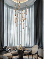 Crystal Raindrop Cascade Chandelier installed as a vertical focal point in a high ceiling room