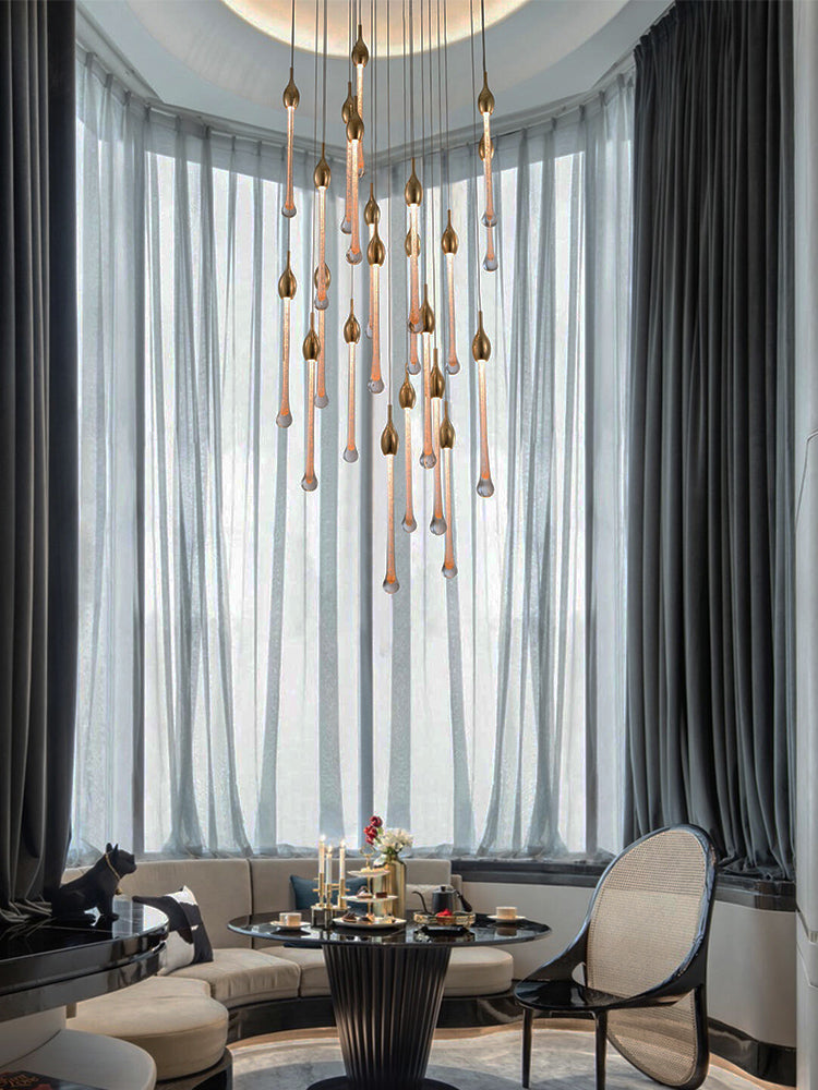 Crystal Raindrop Cascade Chandelier installed as a vertical focal point in a high ceiling room